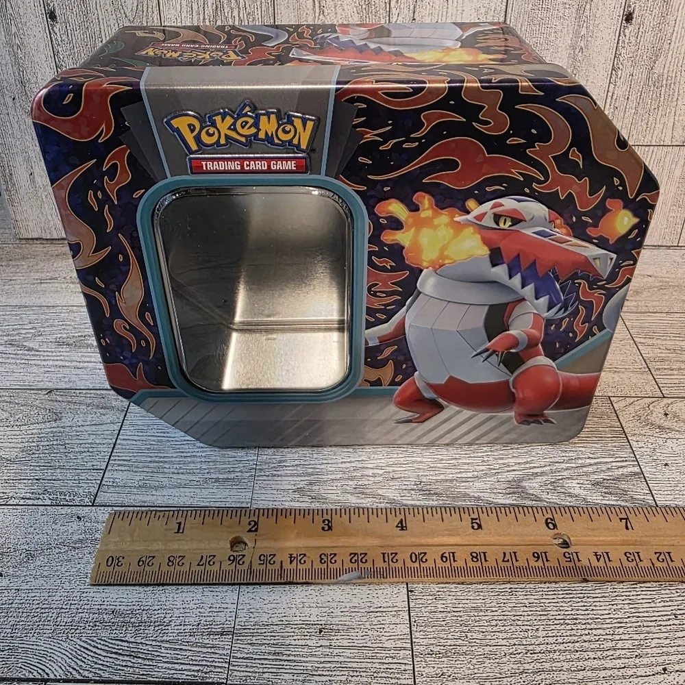 Pokemon Tin with Fiery Red and Black Design